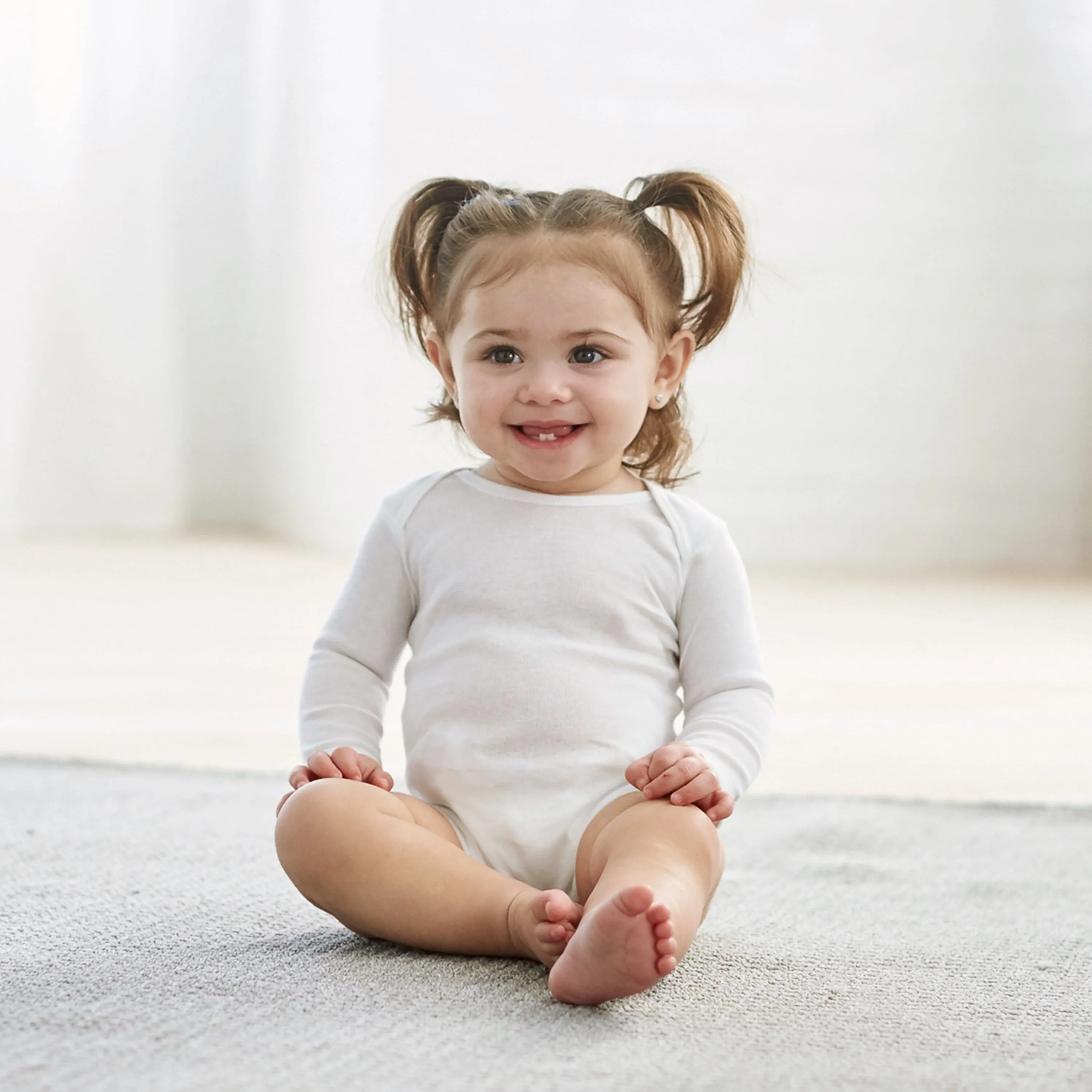 3-Pack White Long Sleeve Onesies® Bodysuits