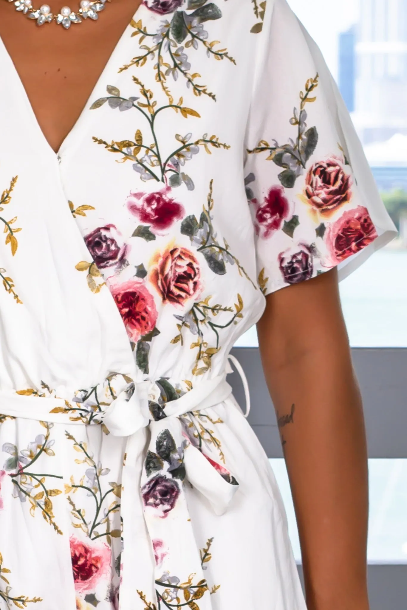 Off White Floral Romper with Sleeves